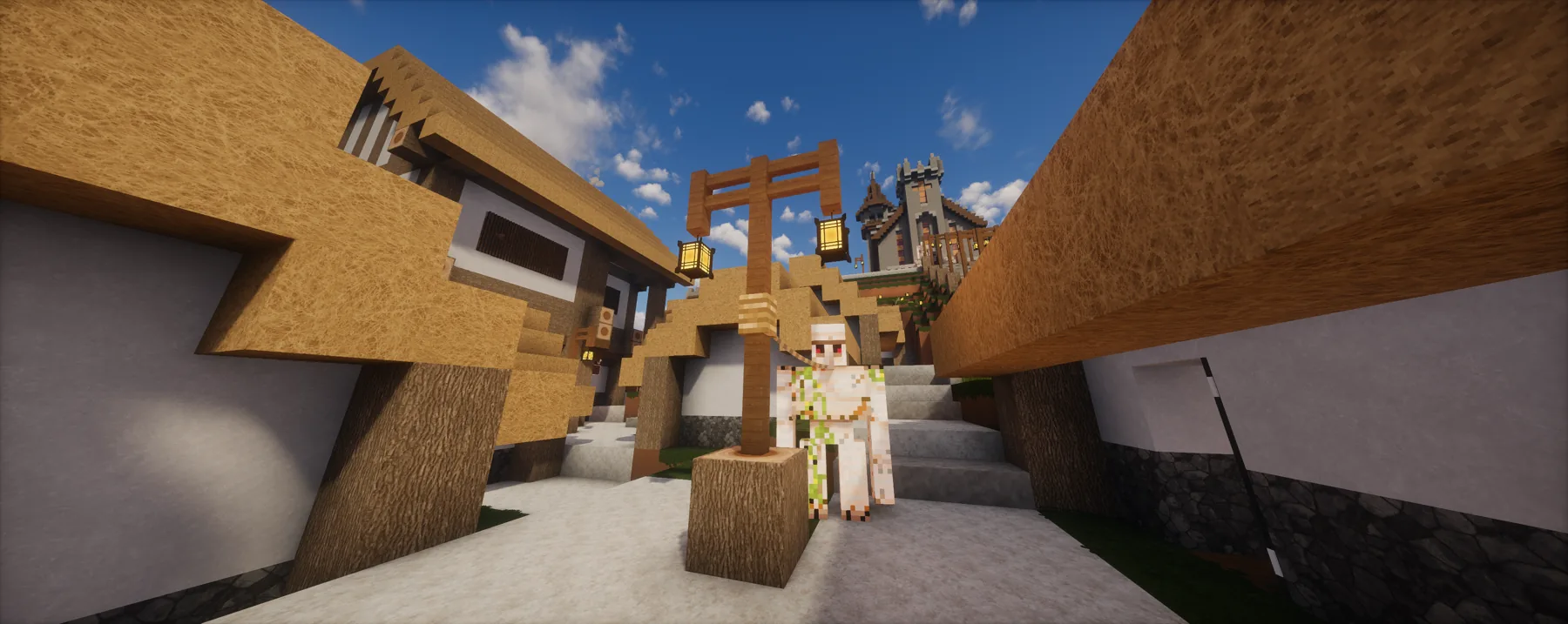 Player standing in the TrainDontStop Minecraft world near large fantasy builds.